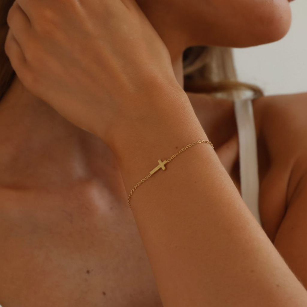 1:1 square cross bracelet on raised wrist